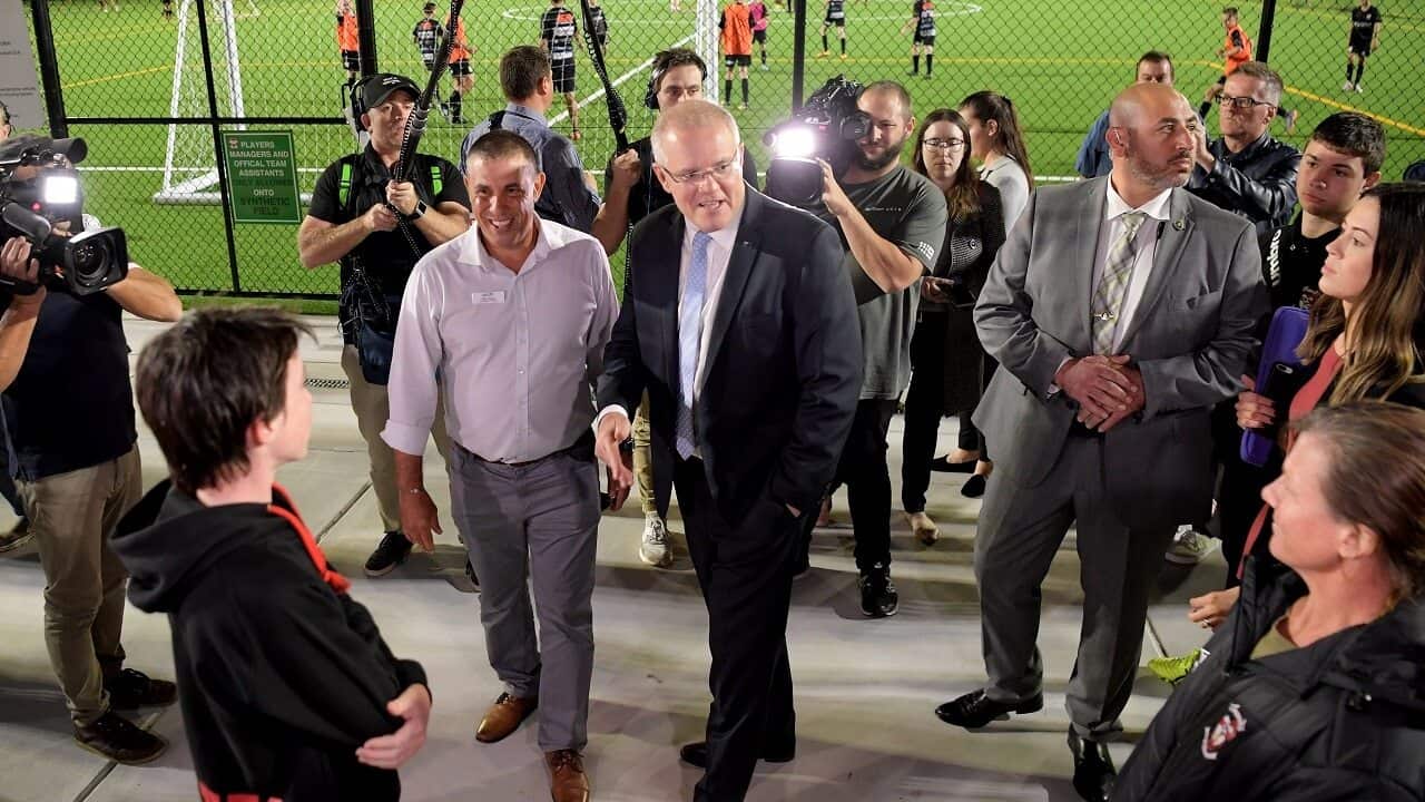 Scott Morrison and then-Liberal candidate for Longman Terry Young on the campaign trail.
