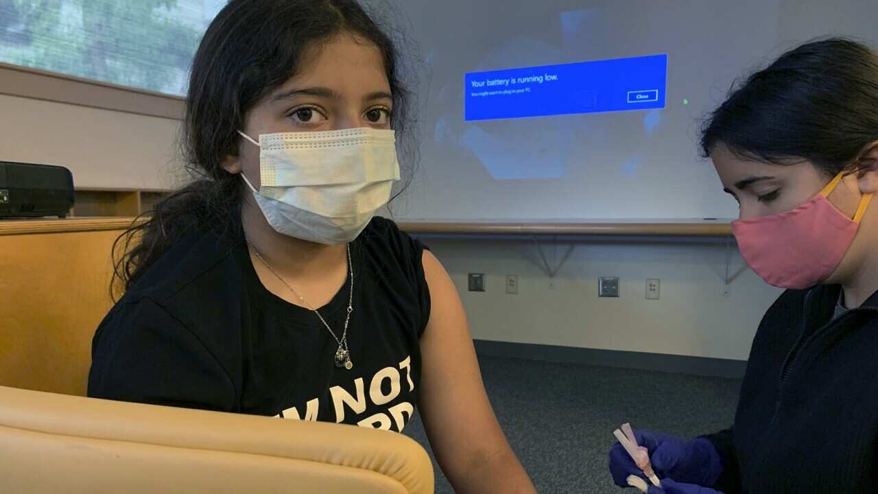 Maya Huber taking part in Pfizer COVID-19 vaccine study at Rutgers University