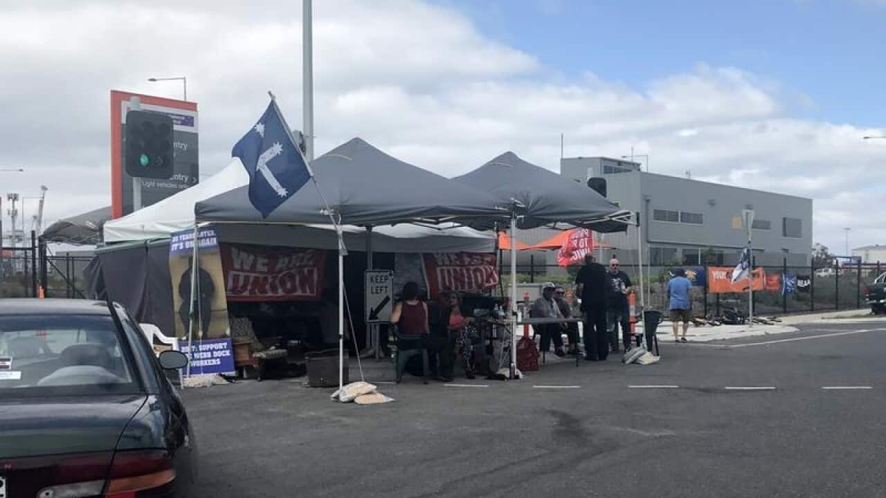A blockade is seen outside Webb Dock port