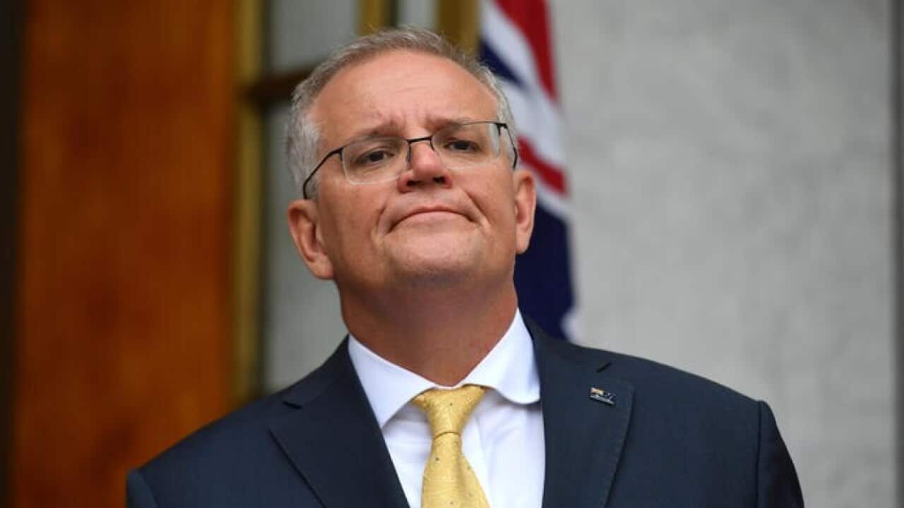 نخستوزیر اسکات موریسن در جریان یک کنفرانس خبری در کانبرا