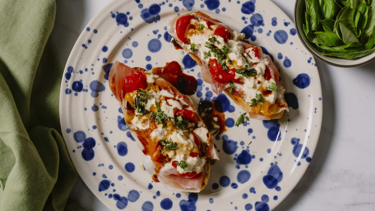 Roasted tomato, burrata and prosciutto on ciabatta toasts