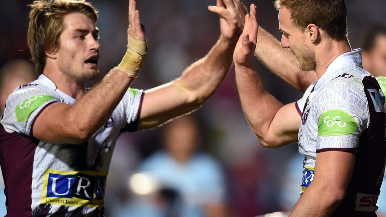 Daly Cherry-Evans (C) and Kieran Foran