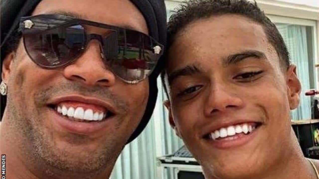 Ronaldinho and his son Joao Mendes