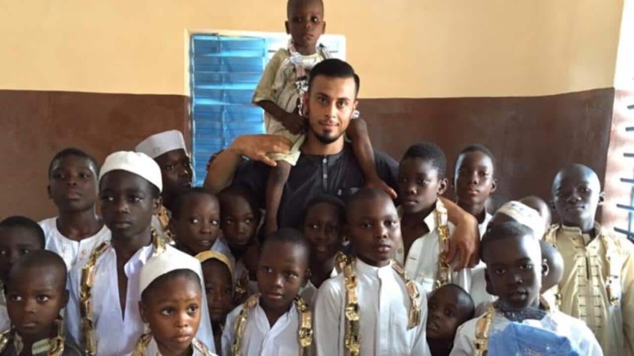 Ali Banat with children