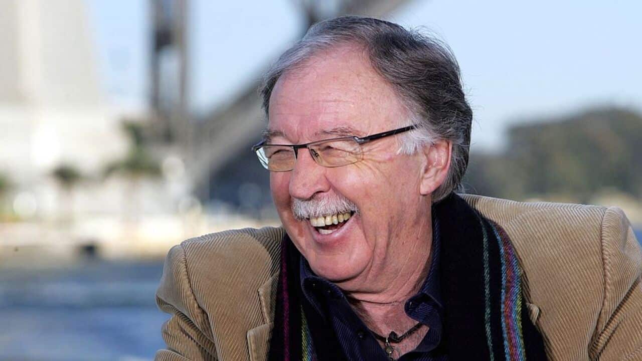 A man in a brown cordurouy jacket