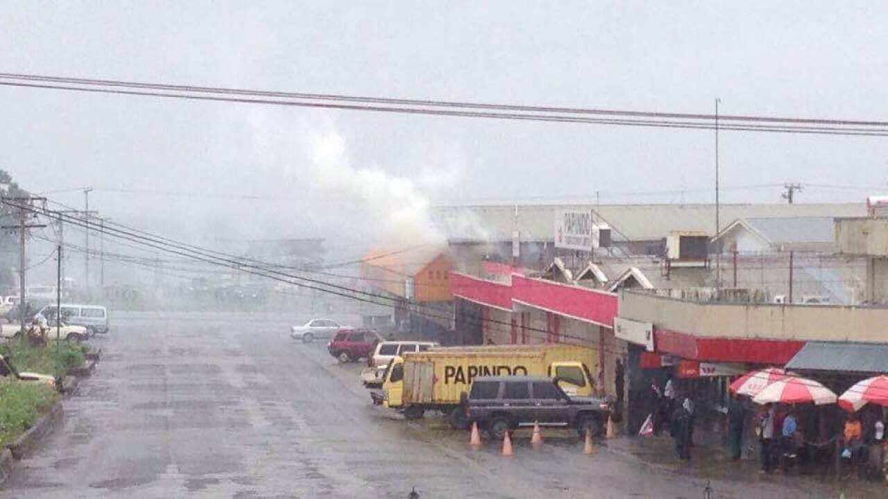 Teargas fired by police in Alotau.