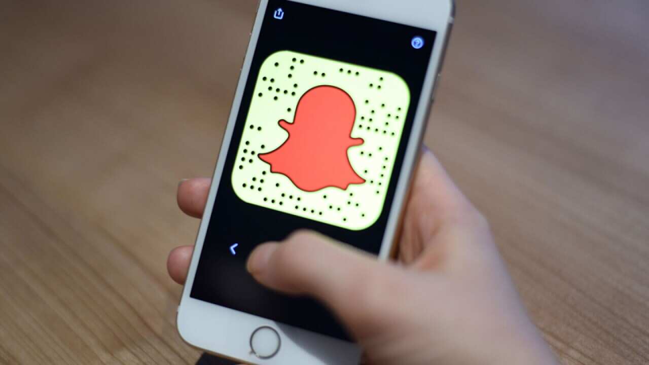 The Snapchat app is seen on a mobile phone
