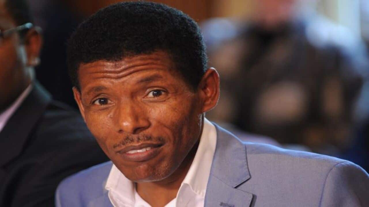 Olympic_great_Haile_Gebrselassie_speaking_at_the_Olympic_hunger_summit_in_Downing_Street,_12_August_2012
