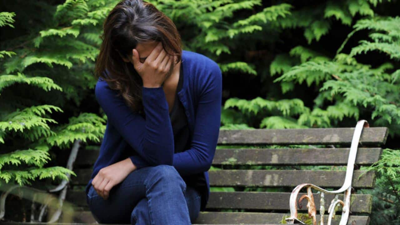 A woman showing signs of depression.