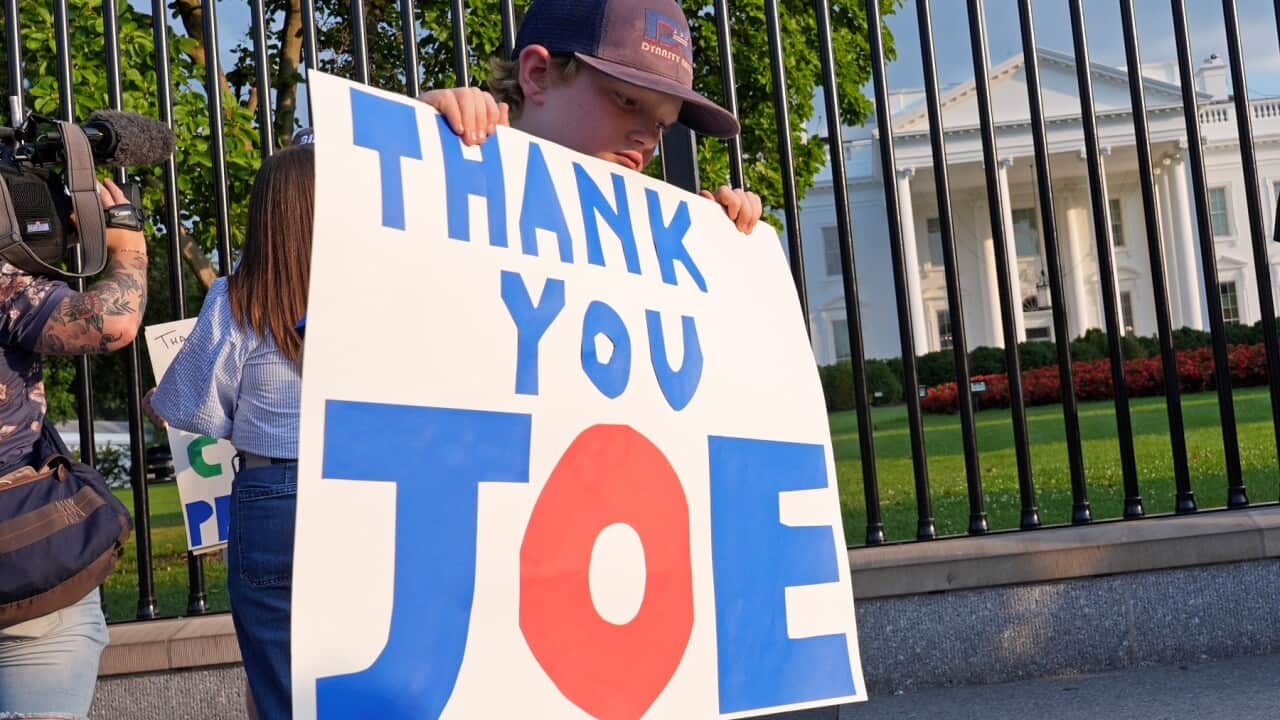10-year-old Hugh Kieve and his family come out to show support for President Joe Biden (AAP).jpg