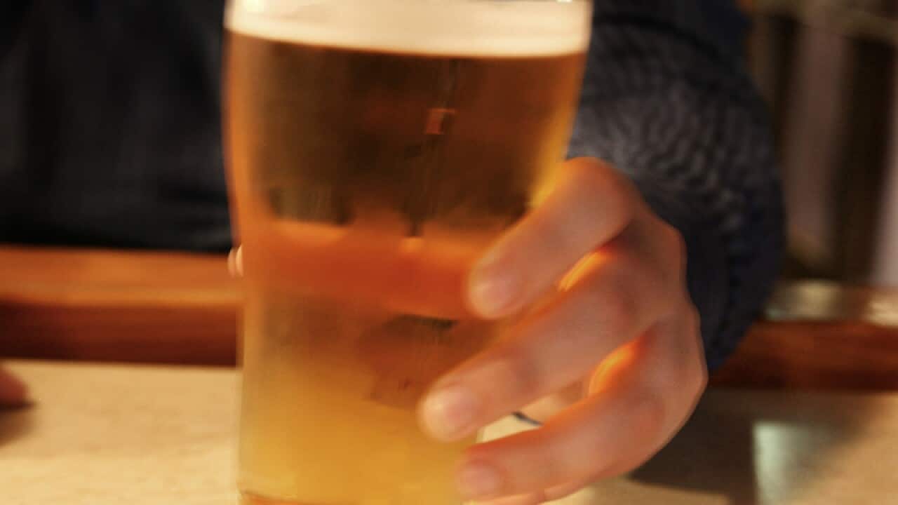 A schooner of beer at a pub