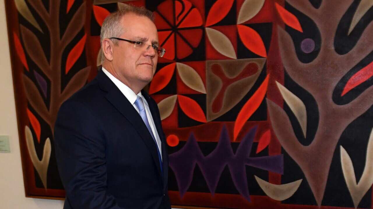 Scott Morrison arrives for the Liberal Party room