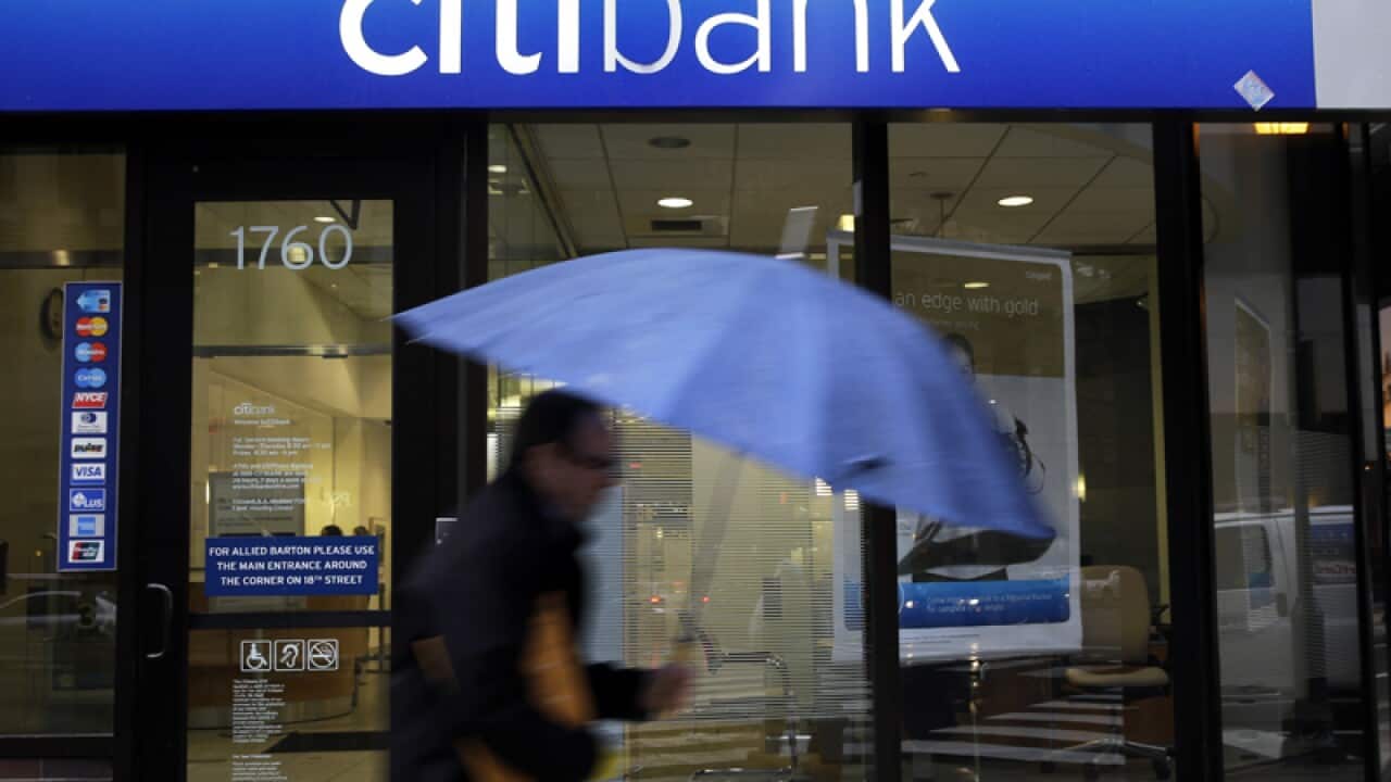 A person walks past a Citibank location in Philadelphia