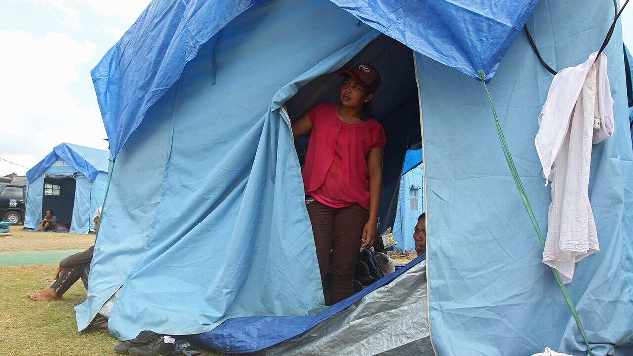 Villagers at an evacuee camp outside the Mount Agung volcano in Klungkung, Bali, Indonesia, Saturday, Sept. 30, 2017.