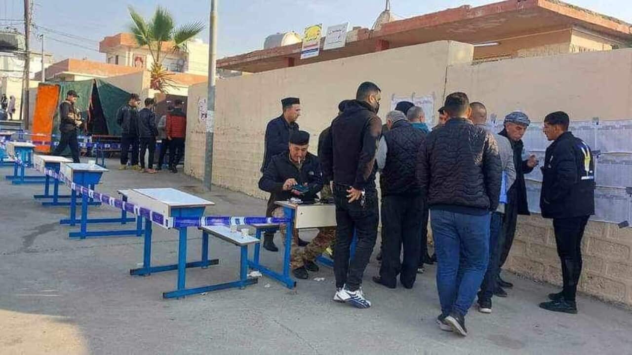 People queing up to vote in provincial elections, Ninava, Iraq.jpeg