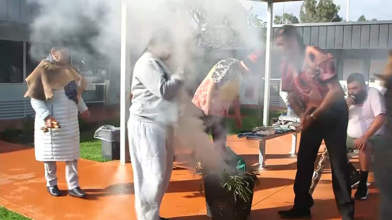 A smoking ceremony as the new facility is opened