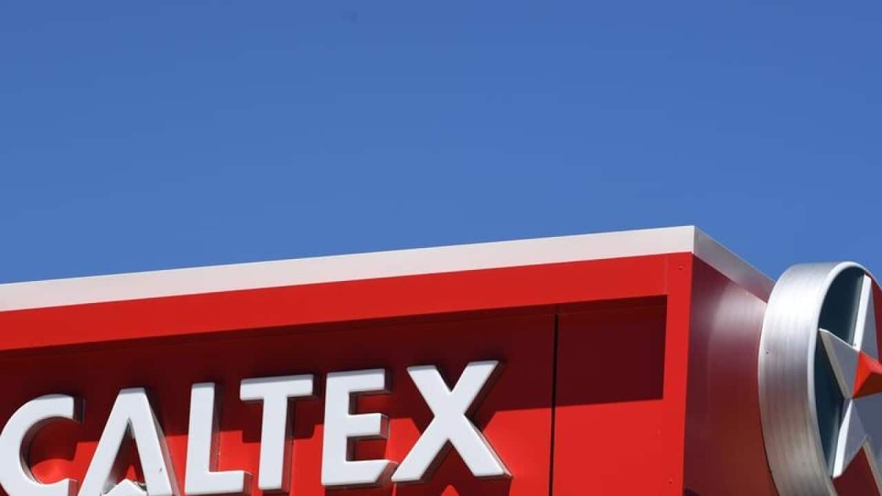 Caltex signage shot against a blue sky