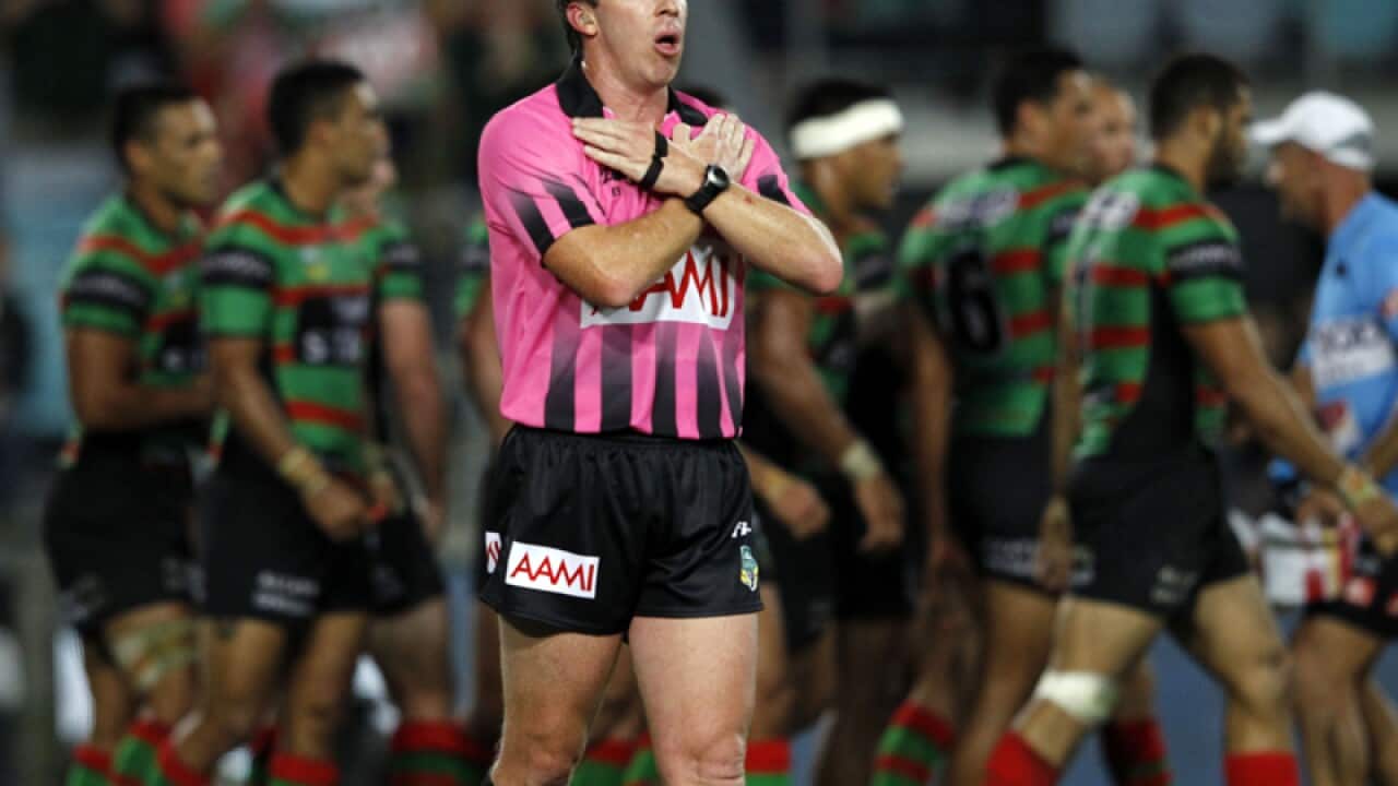 Referee Jared Maxwell makes a call of no try