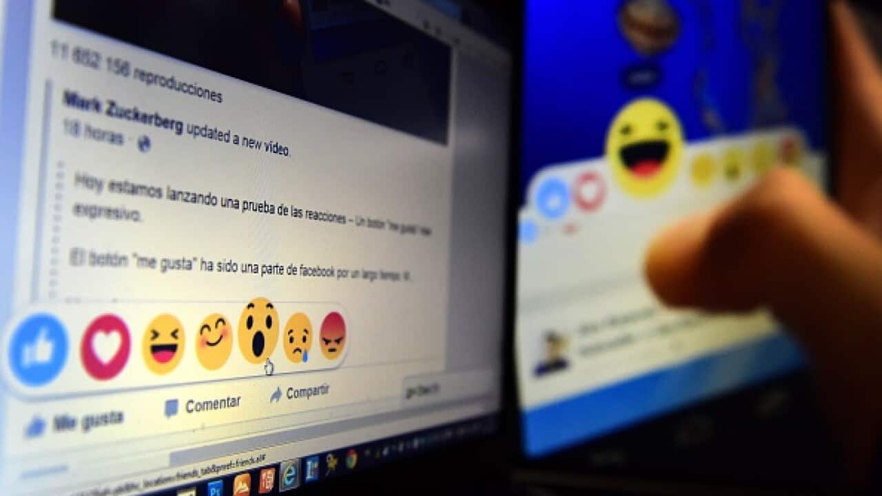 a computer screen displaying the Facebook webpage with the new "Reactions" options as an extension of the "like" button AFP PHOTO / GERARD JULIEN        (Photo credit should read GERARD JULIEN,GERARD JULIEN/AFP/Getty Images)