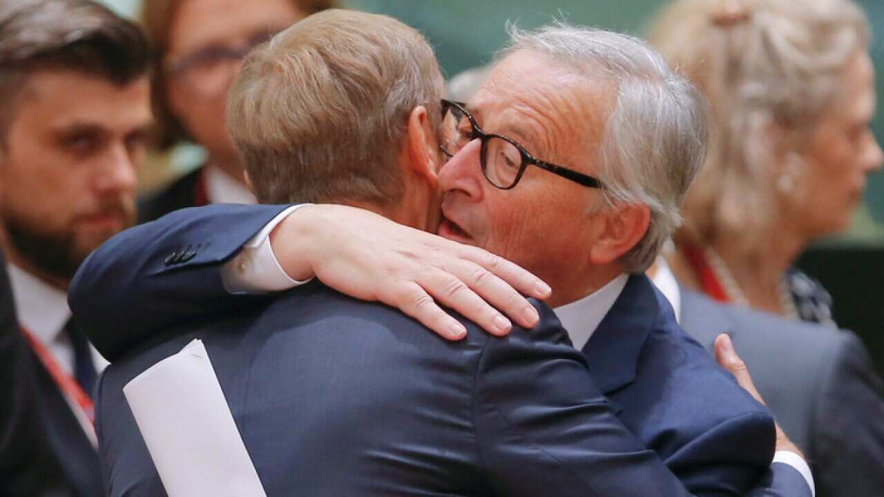 European Council President Donald Tusk (L) and European Commission President Jean-Claude Juncker (R) during an European Council summit in Brussels.