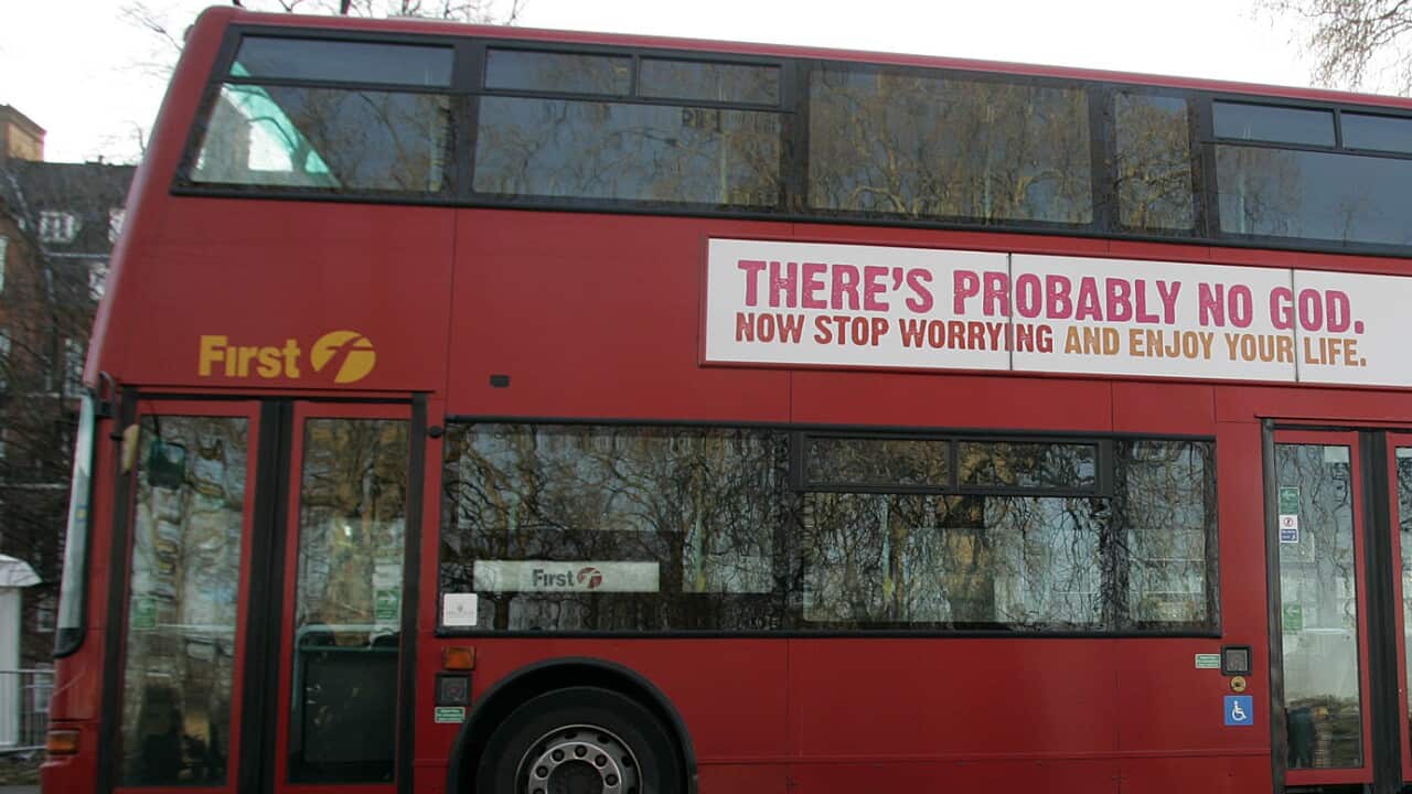 A bus featuring an atheist advertisement