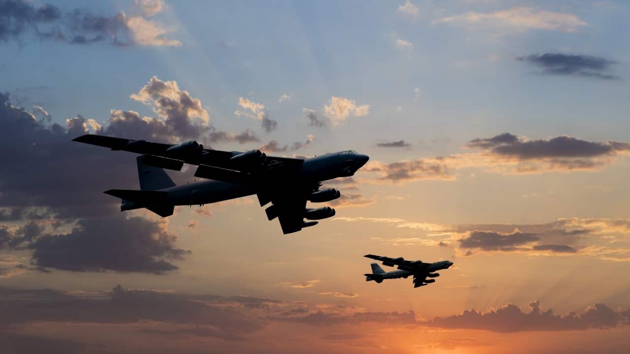 B-52 Bomber Airplanes flying at sunset