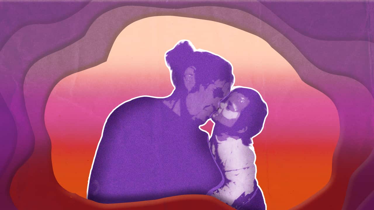 A purple, pink and red illustration depicting an elderly First Nations woman embracing a young First Nations child.