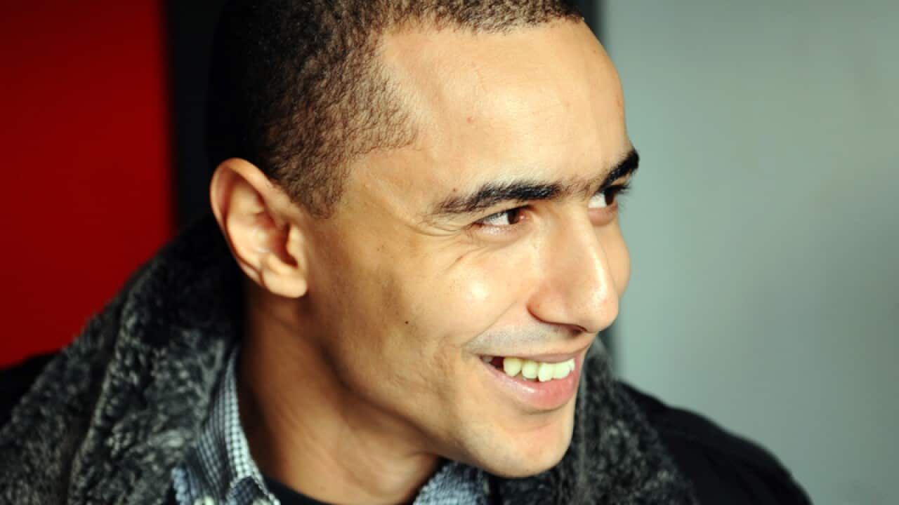 Tunisian rapper Weld El 15 at a courthouse