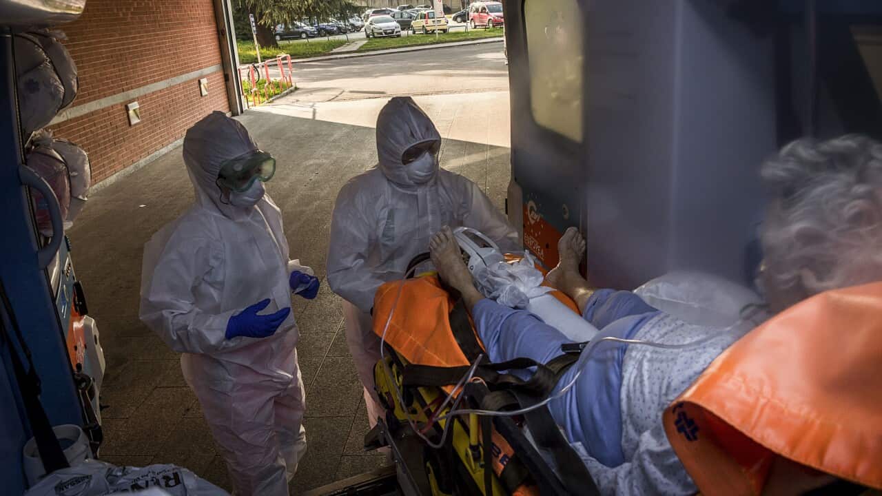 Health workers in Milan intervene with emergency calls on the cases of COVID19 coronavirus preparation and transport to hospital.