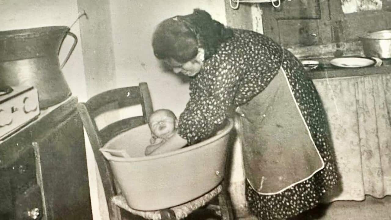 Roberto Ricci when he was 3 months old bathed by his mother in 1962.