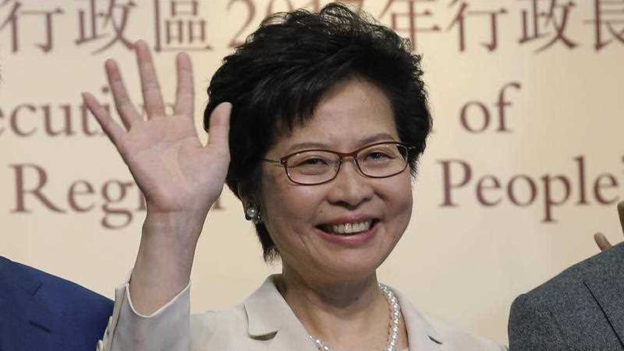 Former Hong Kong Chief Secretary Carrie Lam celebrates after winning the chief executive election of Hong Kong in Hong Kong, Sunday, March 26, 2017. 