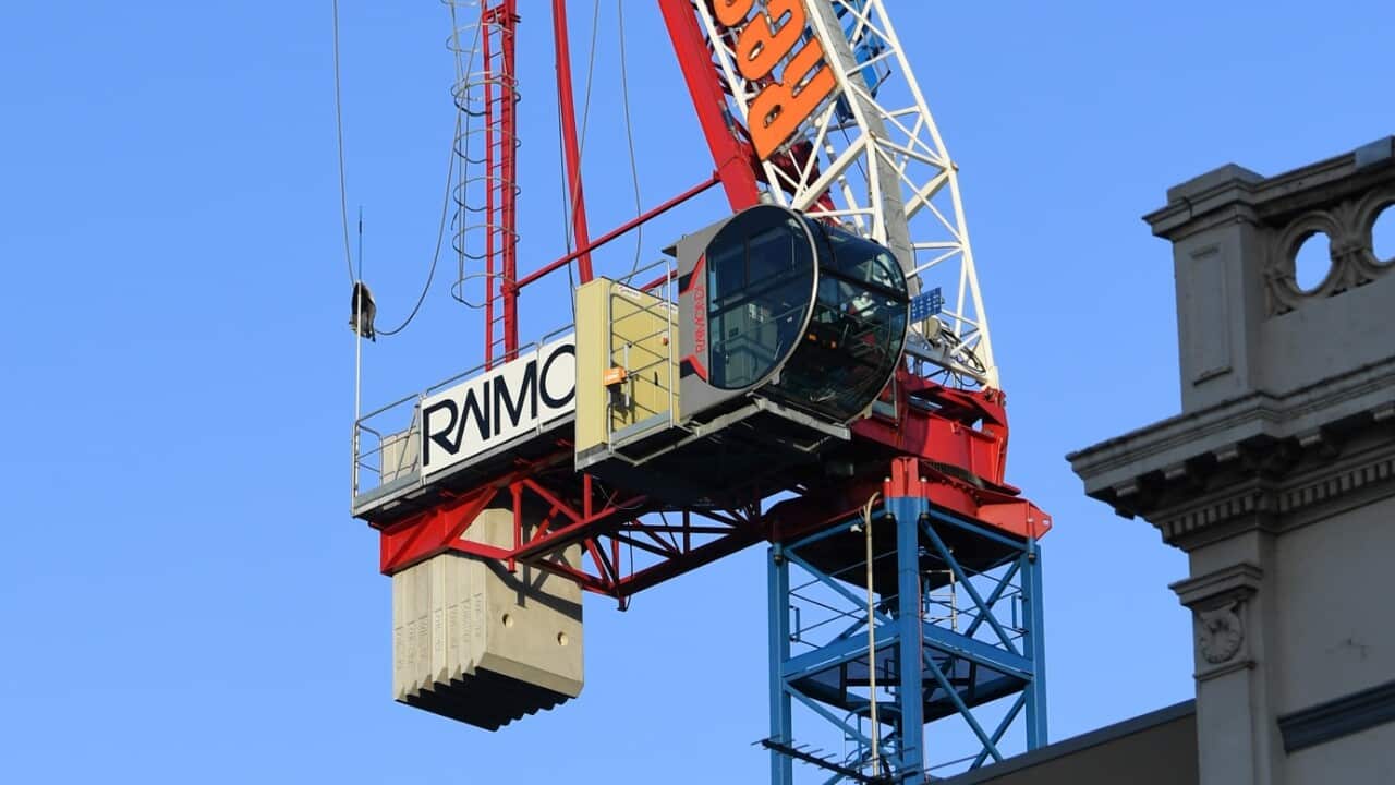 A damaged crane is seen in Richmond, Melbourne, Tuesday, July 24, 2018. 