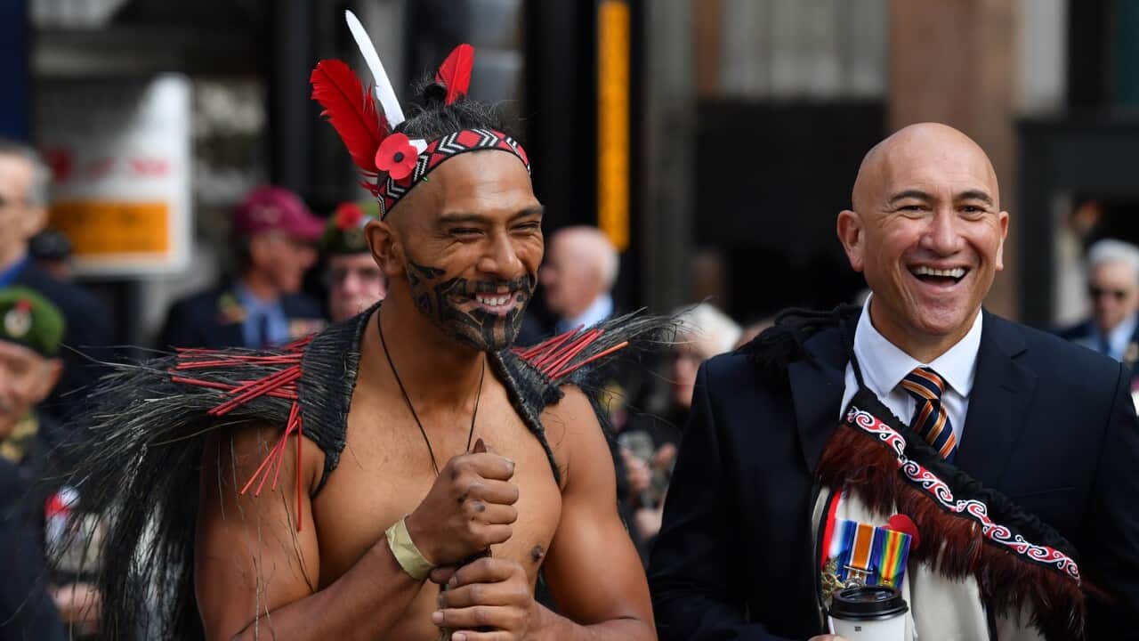 Two New Zealanders wait to march before the Anzac Day March on Elizabeth St in Sydney, Sunday, April 25, 2021. (AAP Image/Mick Tsikas) NO ARCHIVING