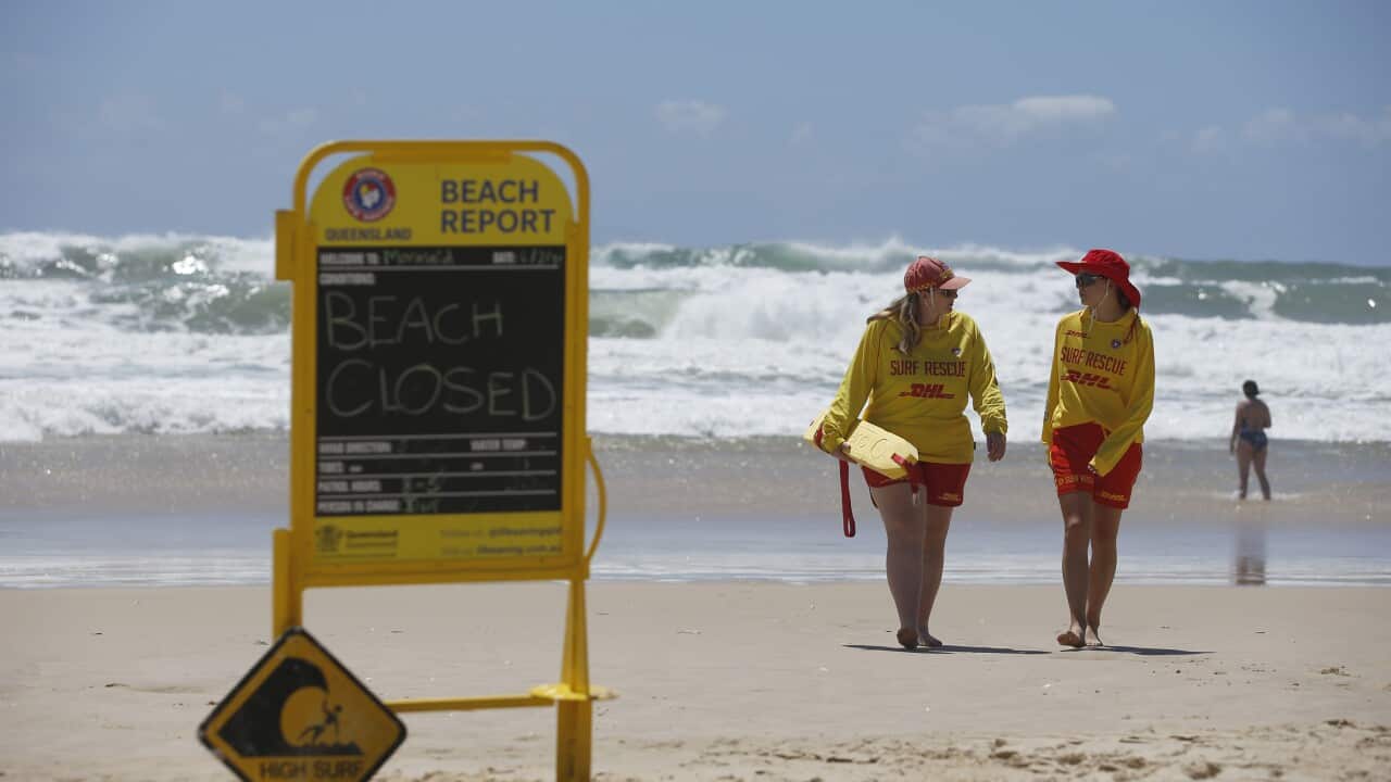 Lifeguards are seen close to a rip at Mermaid Beach, on the Gold Coast