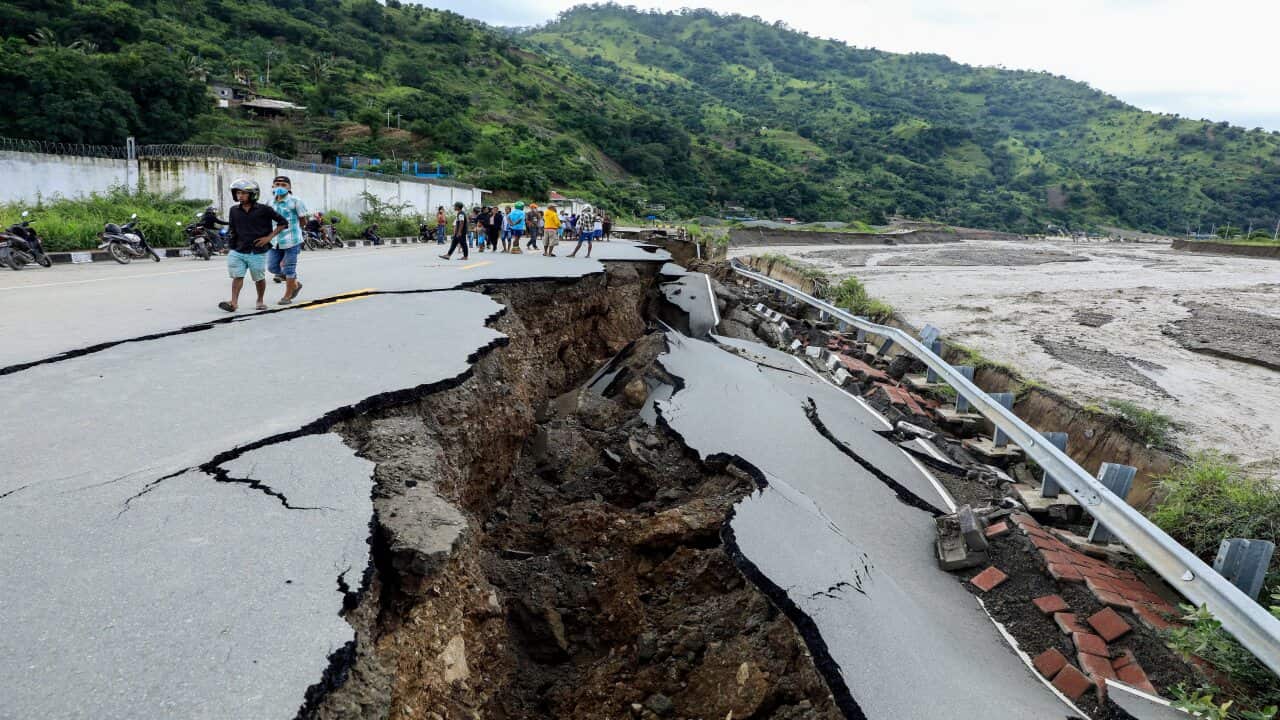 A damaged road in the aftermath of floods in Dili, East Timor, also known as Timor Leste