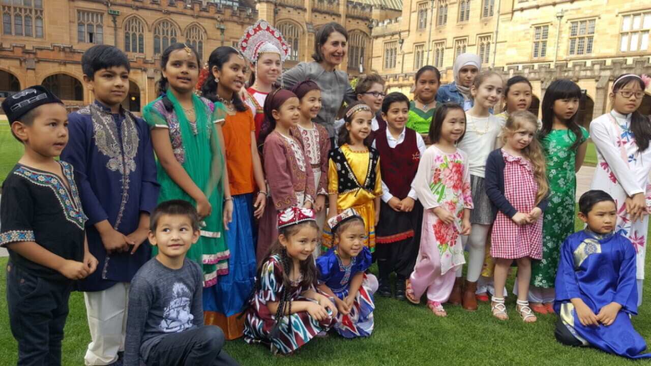 NSW Premier with school children launching the community language education program.