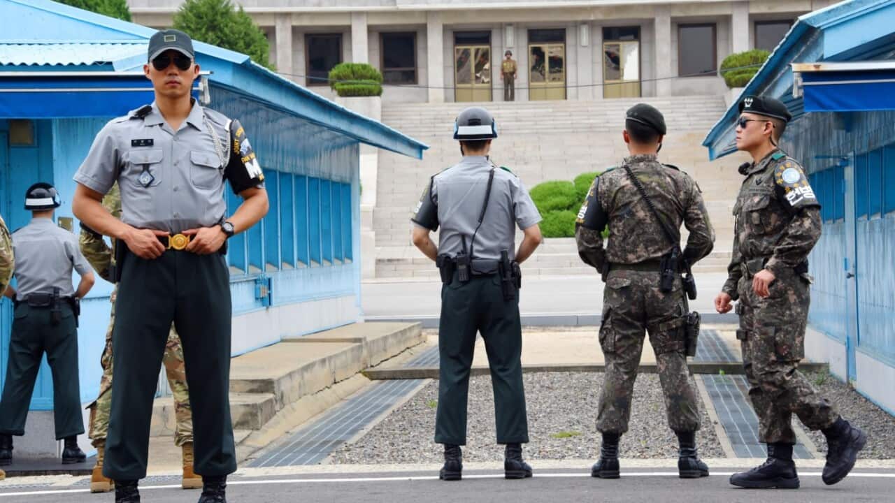 The U.S.-led United Nations Command solders stand guard on Jul. 27, 2017 in front of North Korea's main building