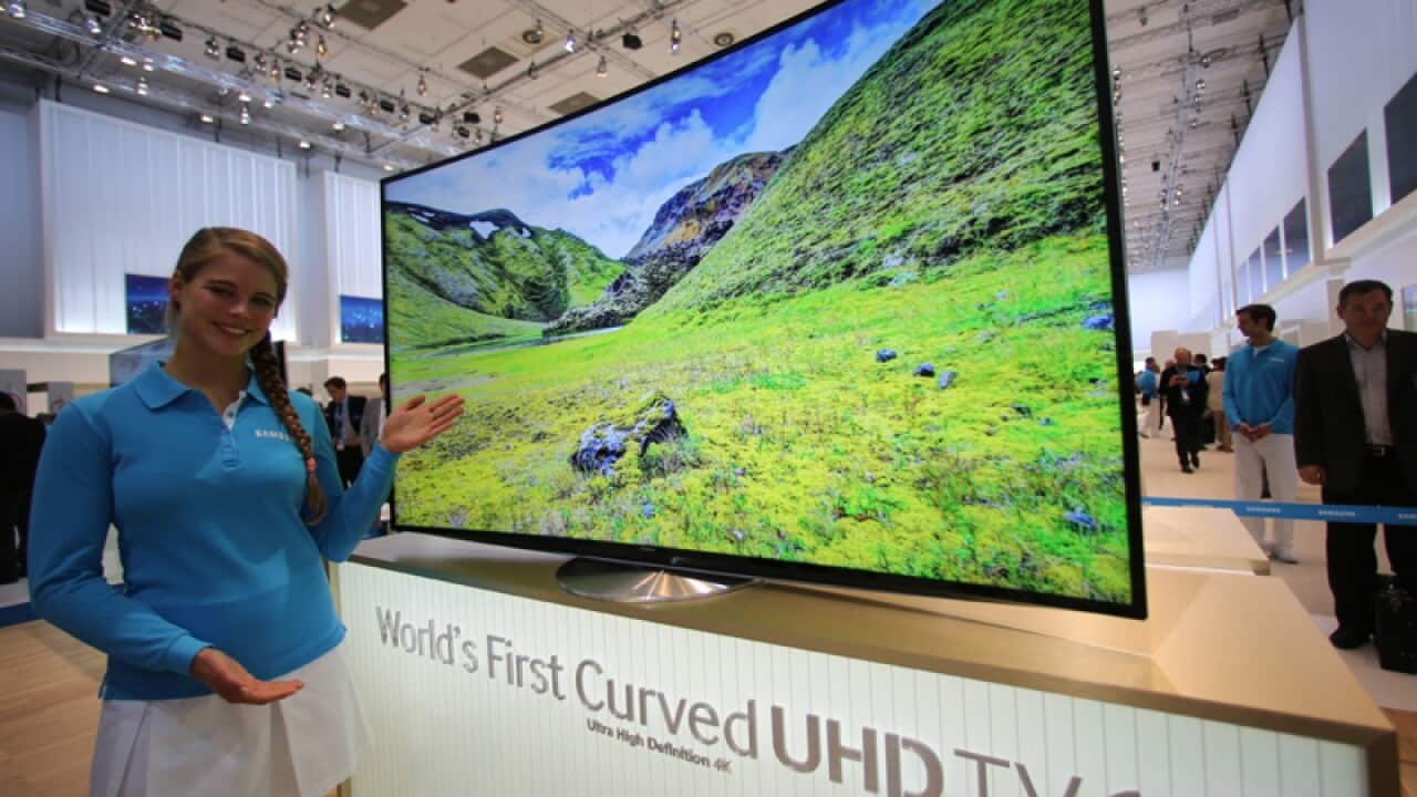 A Samsung curved UHD TV at an expo