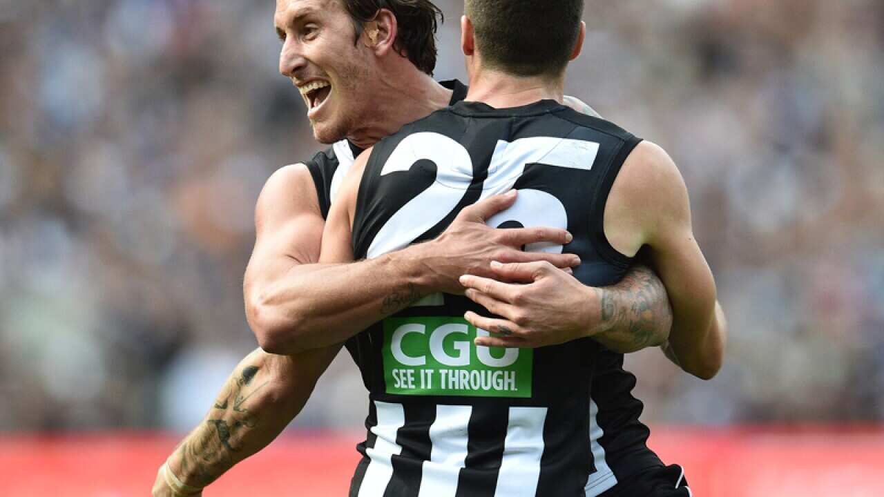 Jesse White (left) and Jack Crisp of the Magpies