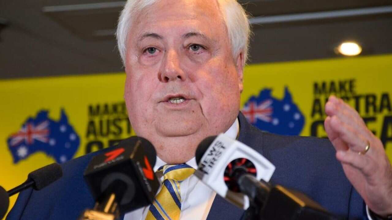 United Australia Party leader Clive Palmer speaks to the media