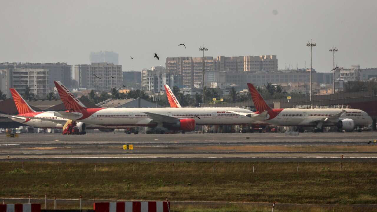 Air India aircraft sit on the tarmac at Chhatrapati Shivaji Maharaj International Airport in Mumbai, India, 17 April 2020.
