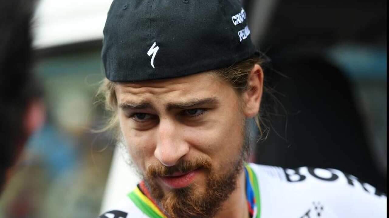 Peter Sagan of team Bora-Hansgrohe chats to one of his team.