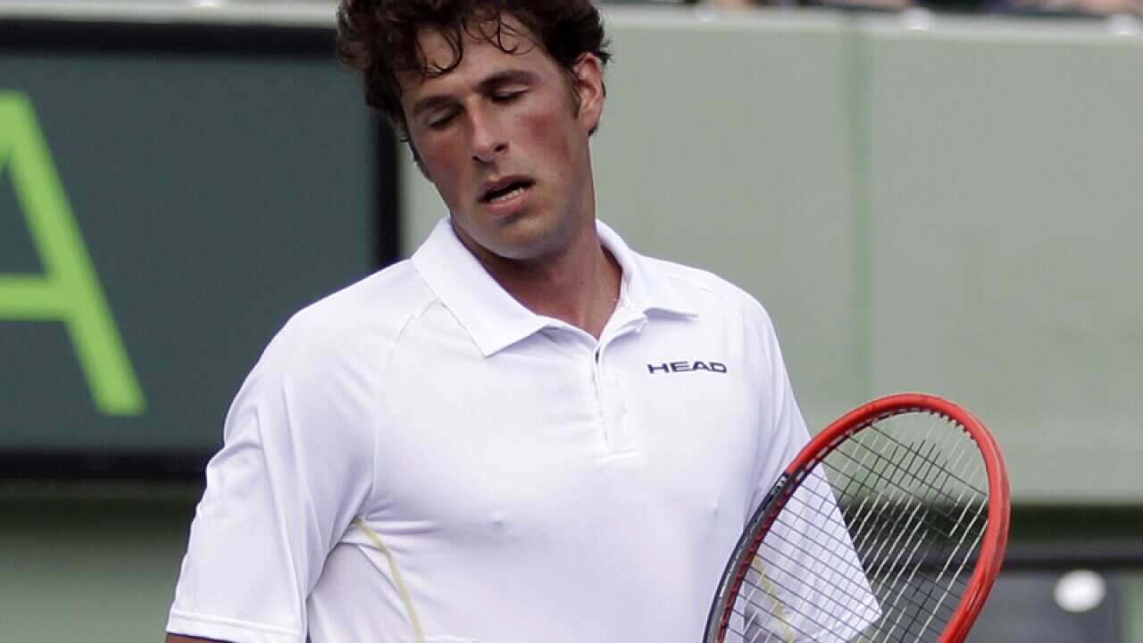 Robin Haase, of the Netherlands, reacts