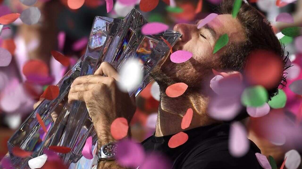 Argentinian tennis player Juan Martin del Potro with the trophy