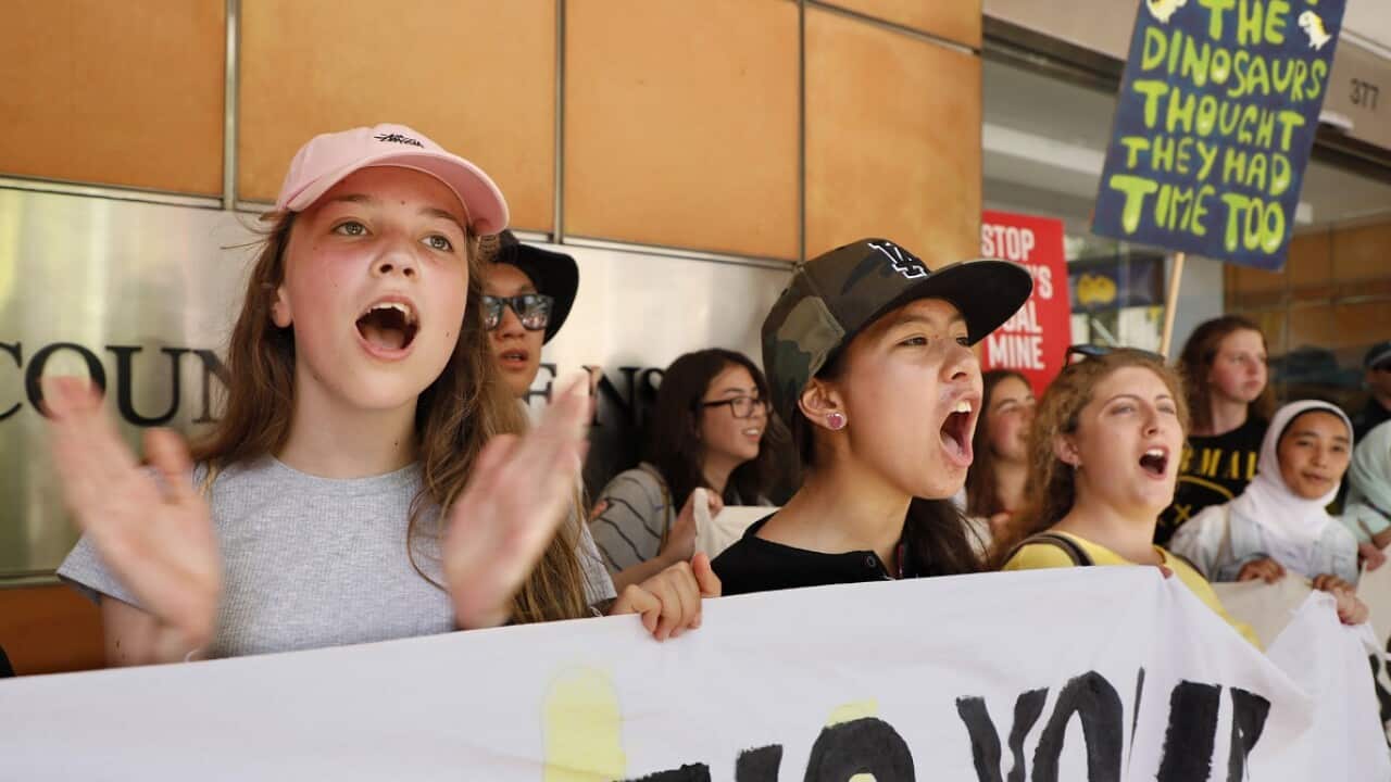 Australian school students rally demanding action on climate change in Sydney.