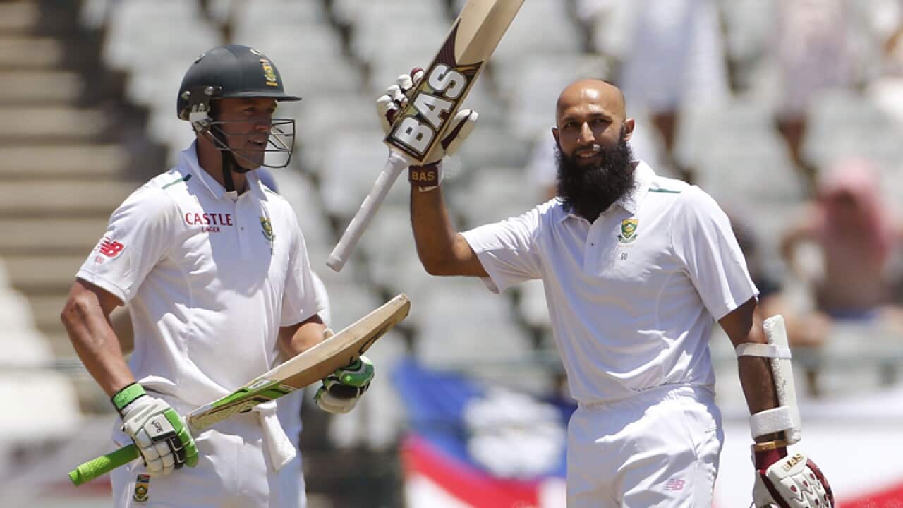 South Africa batsmen Hashim Amla (R) and AB de Villiers
