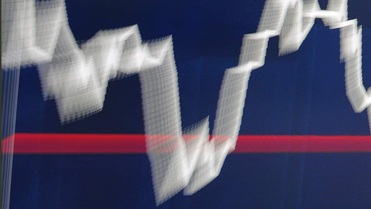 An information board illustrates movements in share prices