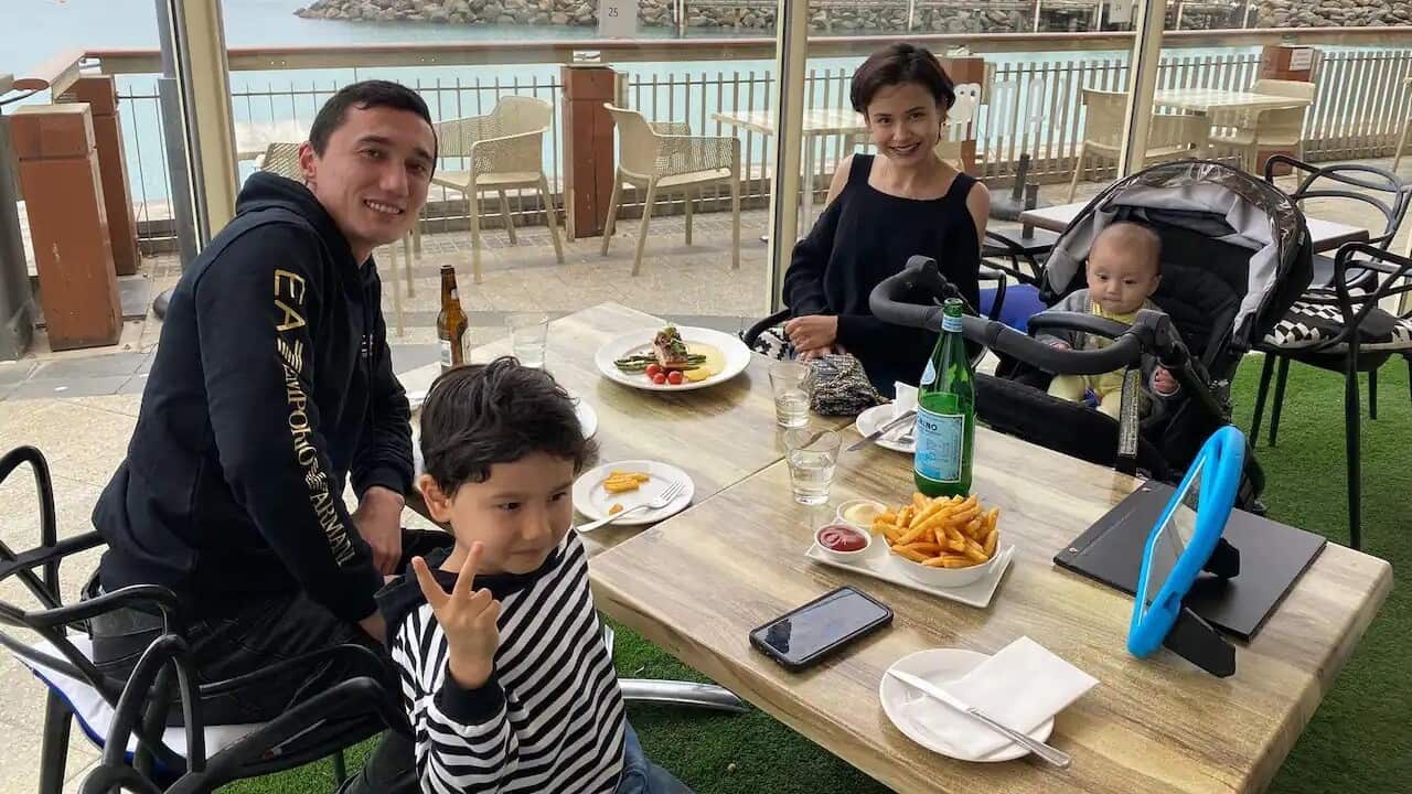 (clockwise from top left) Sadam Abdusalam, Nadila Abdusalam, Latif and Lufti at a restaurant in South Australia (supplied).jpg