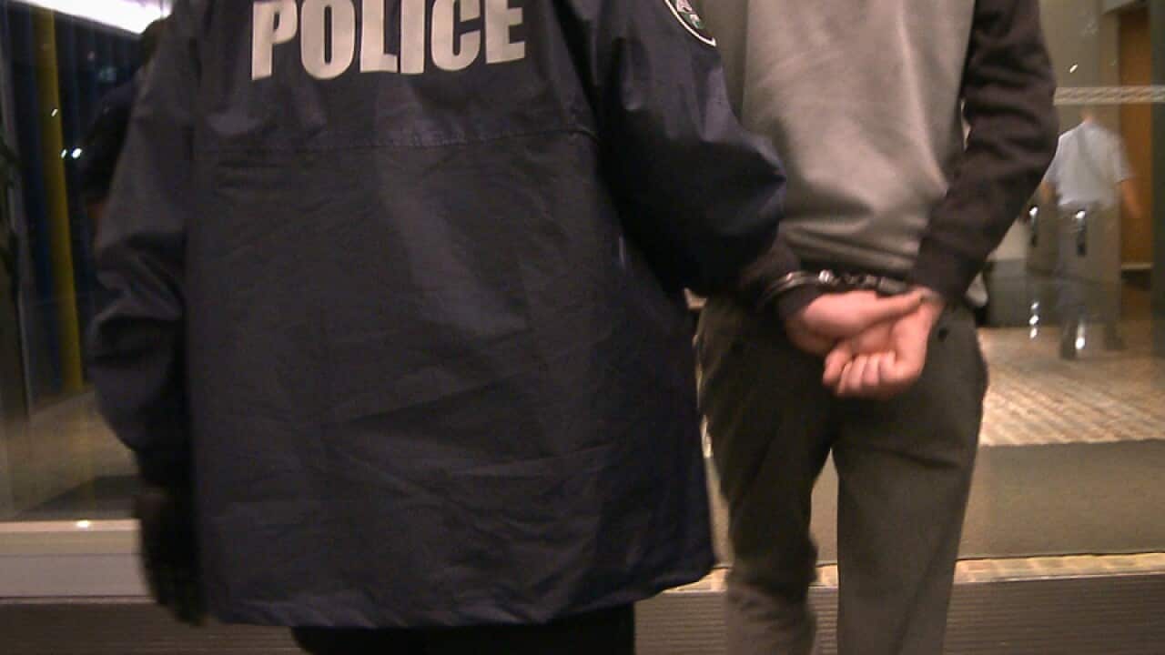 AFP Officers arresting a man