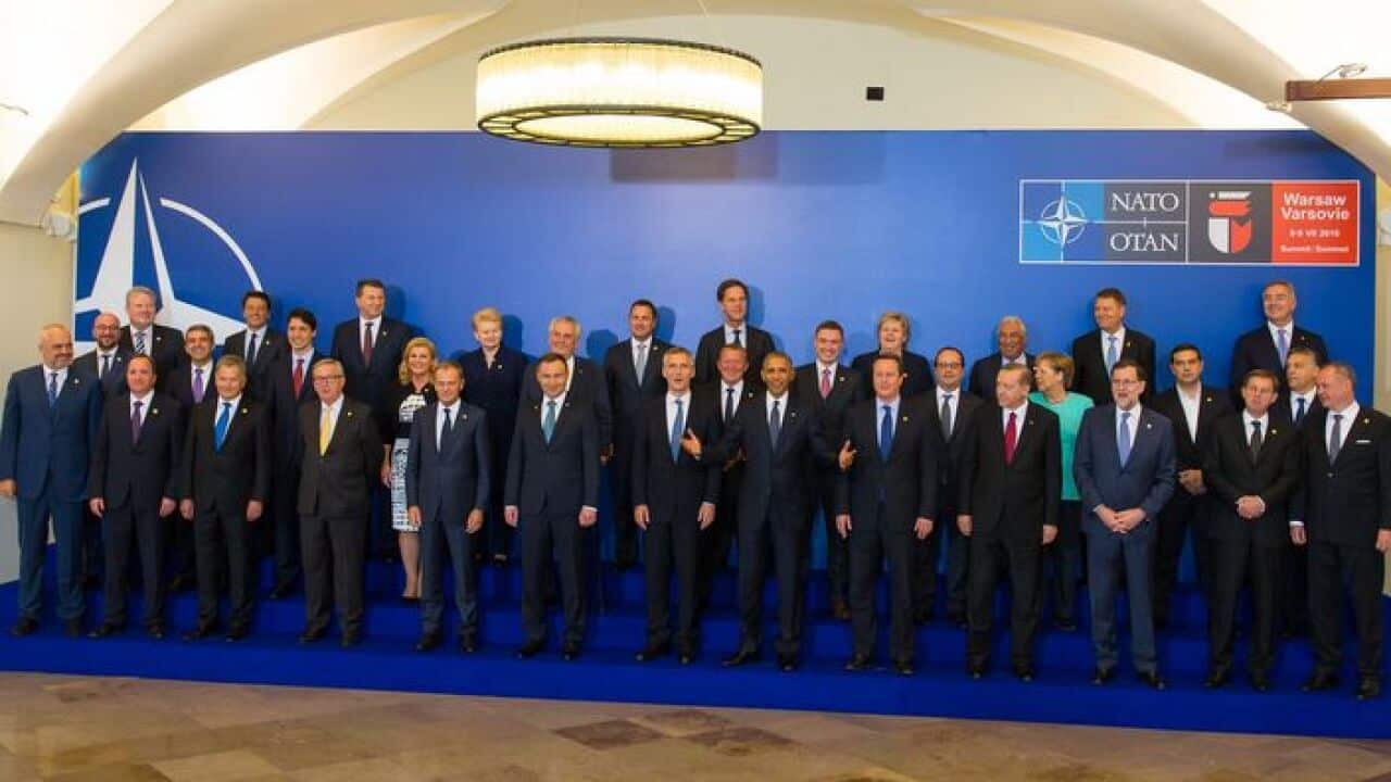Group photograph at the Presidential Palace ahead of a working dinner on day one of the Nato summit, in Warsaw,